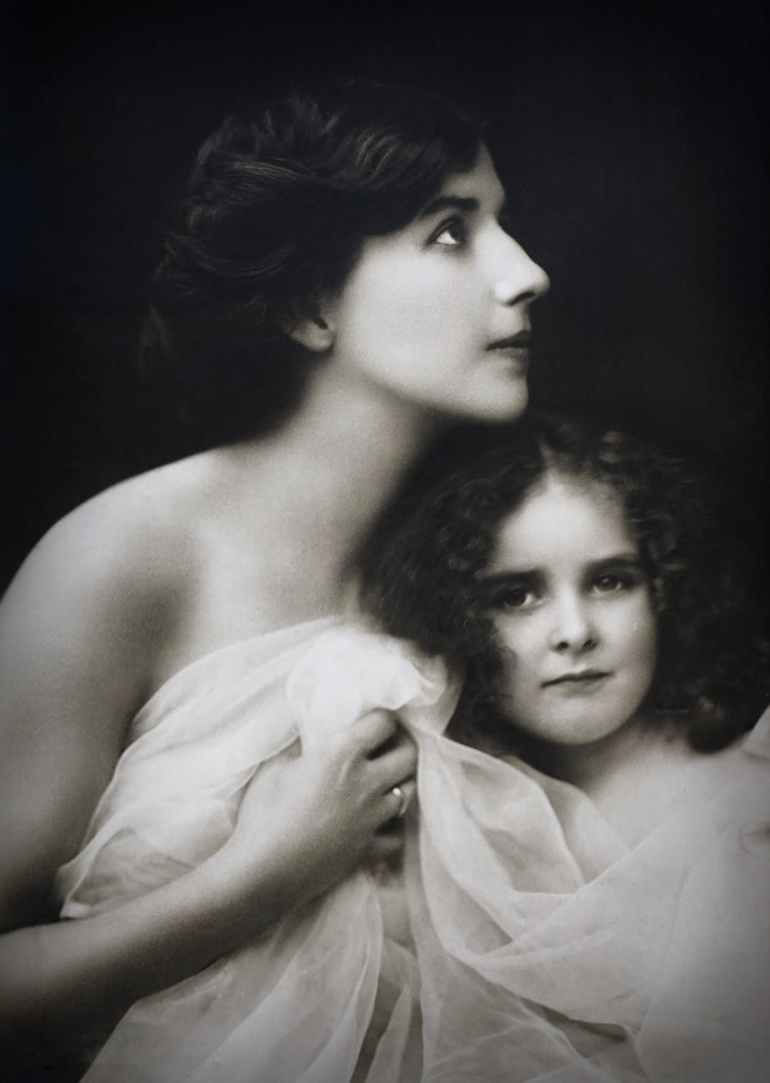 monochrome photo of mother and child